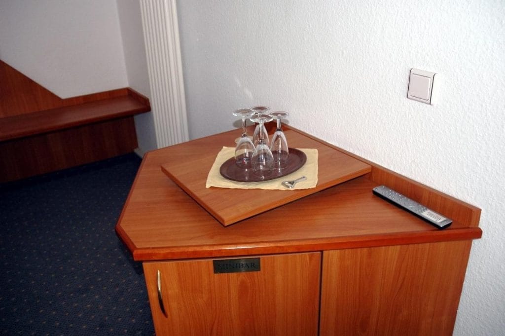 Water glass on table at Parkhotel Goldlinde, Bodenwerder.